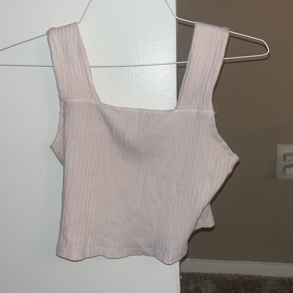 I did wash it with a pink shirt so it is slightly pink.